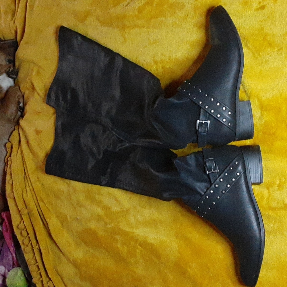 Thigh High boots with buckle detail.